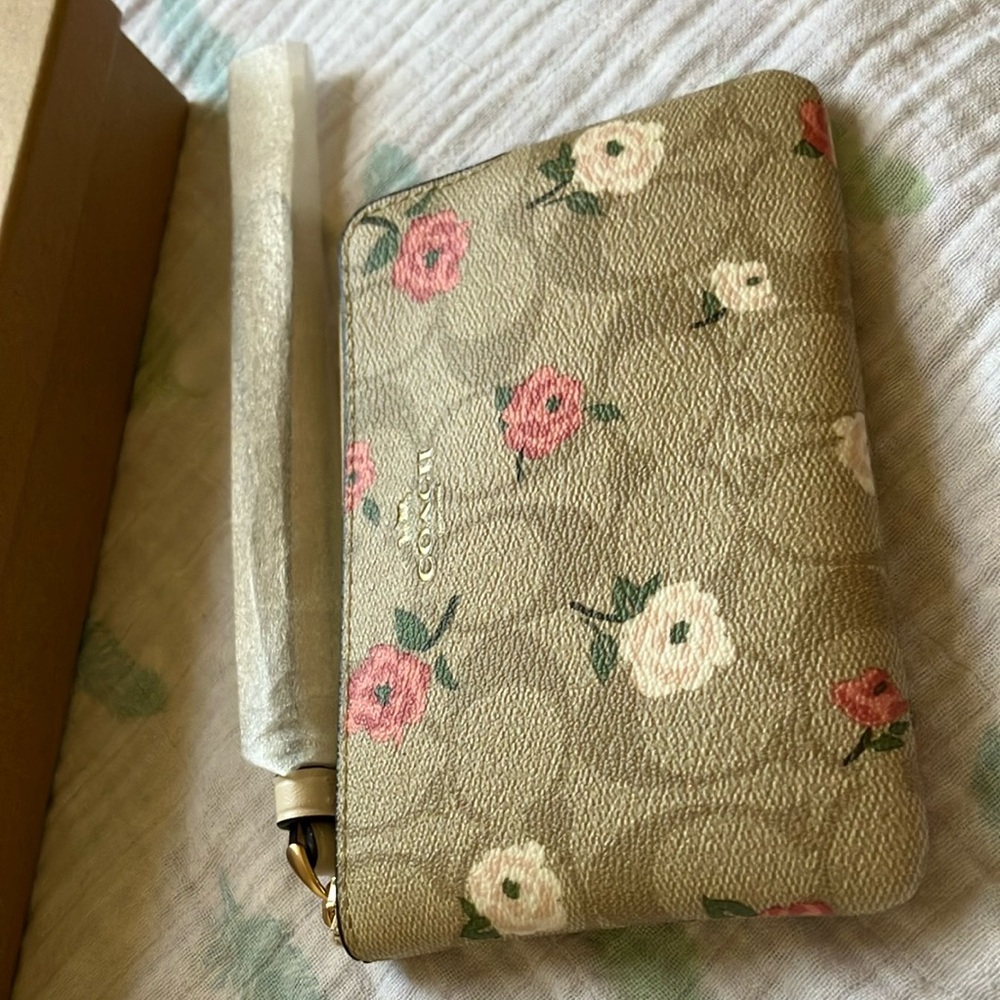 Coach Tan Wristlet with Pink and Cream Floral Design